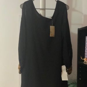Black trendy dress w/golden sequins cuffs.